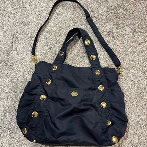 NEST designer diaper Bag with Gold Accents Navy inside pockets totes